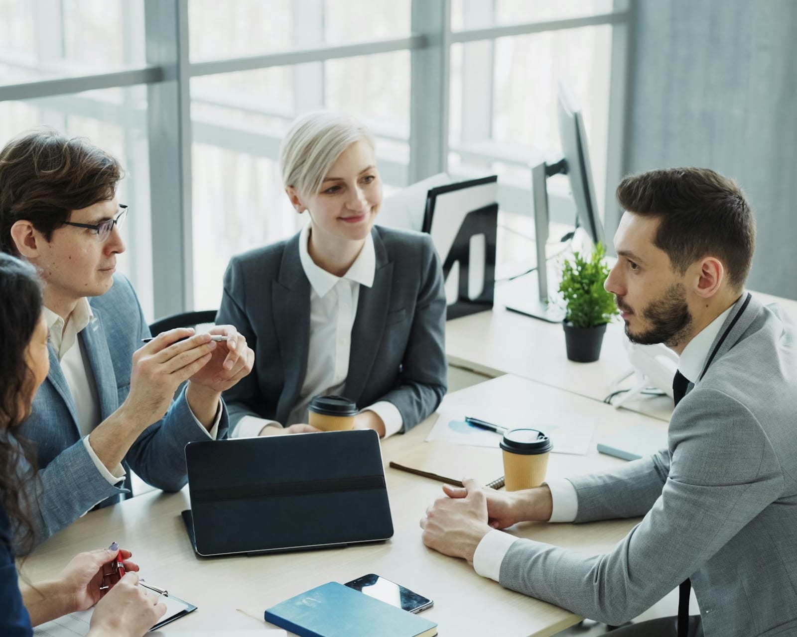 Team collaborating inside a premium managed office