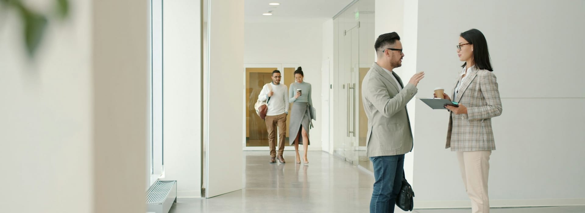 Team members walking through a modern managed office
